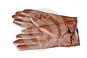 Womens brown leather gloves isolated on white