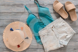 Womens clothing, accessories denim shorts, straw hat, swimsuit,