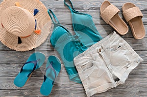 Womens clothing, accessories denim shorts, straw hat, swimsuit,