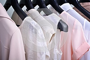 womens clothing pastel colors hanging on the hanger verticalclothing pastel colors hanging horizontal