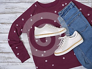 Womens clothing, shoes sweatshirt, white leather sneakers, jeans. Fashion outfit, spring summer collection. Shopping concept.