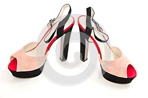 Womens coloured medium heeled court shoes on white.