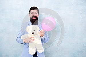 Womens day. Greetings 8 march. Stereotypical gifts. Valentines day. Romantic man with teddy bear and air balloon waiting photo