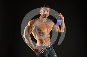 Womens day performance. Bodybuilder holiday gift. Sportsman giving gift. Macho muscular torso hold gift box. Sexy