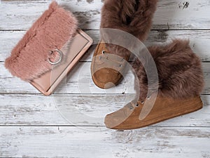 Womens fashion accessories, shoes suede sneakers, crossbody bag. Shopping concept. Flat lay. Winter collection