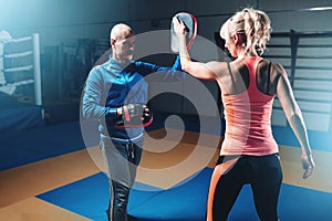 Womens self-defense workout with personal trainer