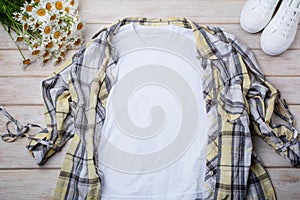 Womens T-shirt mockup with daisy and checkered shirt