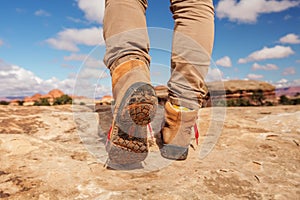 Womens trekking shoes while hiking in mountains