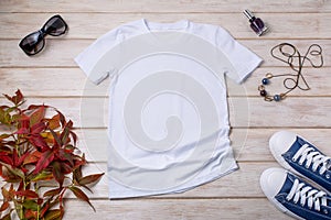 Womens white T-shirt mockup with blue sneakers