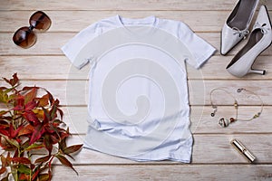 Womens white T-shirt mockup with high heels and grass