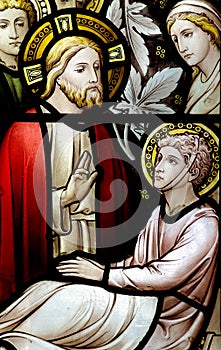 Wonder of Jesus: curing a sick man in stained glass photo