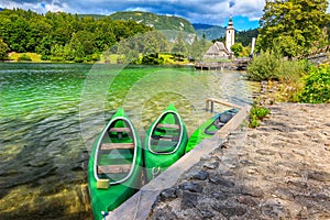 Wonderful alpine lake and colorful boats,Lake Bohinj,Slovenia,Europe