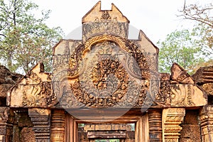 Wonderful carvings in the kudu-arch at the temple.Banteay Srei temple, Siem Reap, Cambodia, Asia