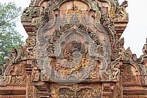 Wonderful carvings in the kudu-arch at the temple.Banteay Srei temple, Siem Reap, Cambodia, Asia