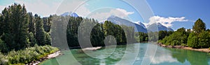 Wonderful day in Canada: Beautiful Skeena River leads through beautiful mountain scenery / British Columbia / Canada