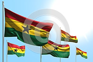 Wonderful day of flag 3d illustration - 5 flags of Ghana are wave on blue sky background
