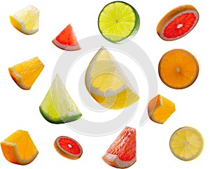 Wonderful fruity set. Pieces of orange, lemon lime and grapefruit glow from inside and fly through the air. High resolution and