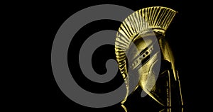 A wonderful golden spartan helmet as part of the equipment of ancient Greek soldiers