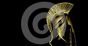 A wonderful golden spartan helmet as part of the equipment of ancient Greek soldiers