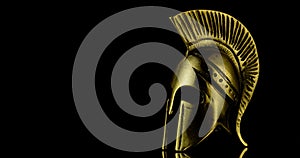 A wonderful golden spartan helmet as part of the equipment of ancient Greek soldiers