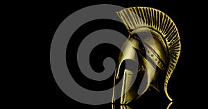 A wonderful golden spartan helmet as part of the equipment of ancient Greek soldiers