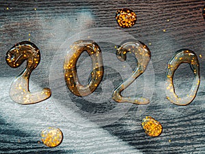 Wonderful Greeting card Happy New Year 2020. Creative Square holiday web banner or billboard with gold sequins 2020 written