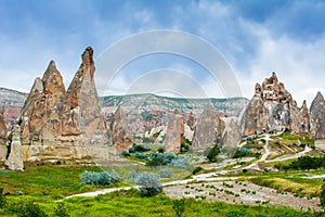 Wonderful landscape with ancient church at Cappadocia, Anatolia, Turkey. Volcanic mountains in Goreme national park.