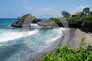 Wonderful landscape: bay with huge wave and black sand from your dream vacation