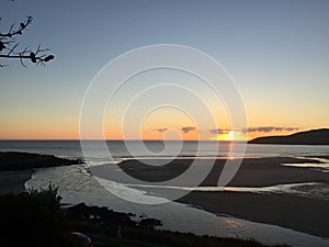 Wonderful landscape of the Spanish Shore at sunset. Hermoso atardecer en el mar. photo