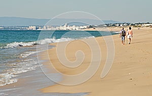 Wonderful long sandy beaches on the Farol Island, faro, Algarve - Portugal photo