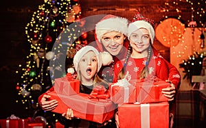 Wonderful moments christmas. Achieve impeccable christmas day. Little girls with lot gift boxes. Christmas morning