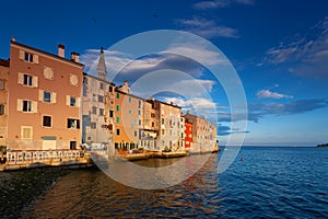 Wonderful morning view of old  Rovinj town with multicolored buildings and yachts moored along embankment, Croatia