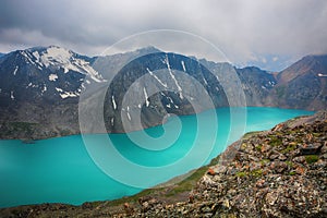 Wonderful mountain landscape lake, highland, peak, beauty world Picturesque view near Alakul lake in Terskey Alatoo mountains,