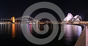 Wonderful Night view of Harbor Bridge and opera house with colourful city at Sydney, Australia.