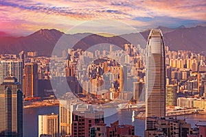 Wonderful panoramic of Hong Kong city view, modern cityscape during sunset in the evening amazing warm toned light