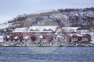 Wonderful red houses in the village Stokmarknes in Norway, Lofoten