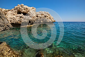 Wonderful rocky coast with caves and grottoes