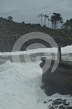 Wonderful Snapshots Taken In The Port Of Lekeitio Of Huracan Hugo Breaking Its Waves Against The Port And The Rocks Of The Place. photo