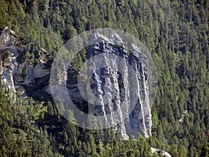 A wonderful steep stone spike (Crap Furo) above the river Albula or Alvra, Surava - Switzerland (Schweiz)