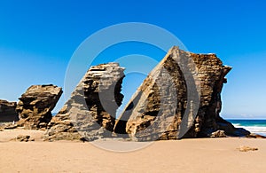 Playa de las Catedrales. Wonderful stone figures. Cathedrals beach at the Atlantic Ocean, Cantabric coast Lugo, Galicia, Spain photo