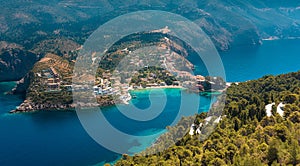 Wonderful summer seascape of Ionian Sea. Wonderful place for holiday. Amazing Greece. Picturesque colorful village Assos in