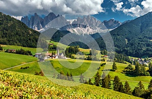 Wonderful Sunny Landscape of Dolomite Alps. Countryside view of the St. Magdalena or Santa Maddalena in the National Park Puez