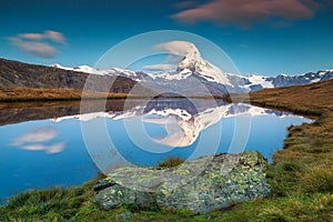 Wonderful sunrise with Matterhorn peak and Stellisee lake, Valais, Switzerland