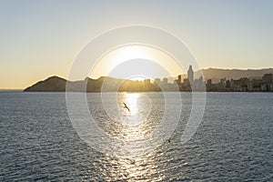 Wonderful sunset panorama over Benidorm skyline, beach city in Spain.Famous destination in Costa Blanca, Alicante.Holidays and