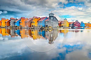 Beautiful colorful buildings on water, Groningen, Netherlands, Europe photo