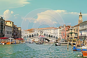 Wonderful view of gondolas and bridges in love on the Grand Canal in Venice, Italy, Europe