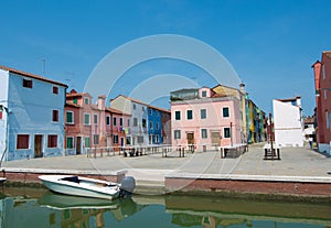 Walking through the streets of Burano. Colorful houses.