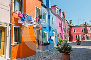 Walking through the streets of Burano. Colorful houses.