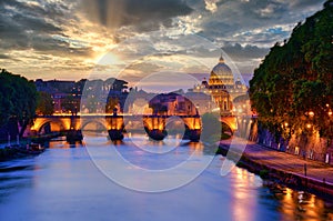 Wonderful view of St Peter Cathedral, Rome, Italy. Sunset light with cloudy sky