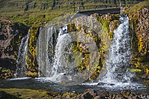 Wonderful waterfal Kirkjufellsfossl in Iceland in Autumn colors